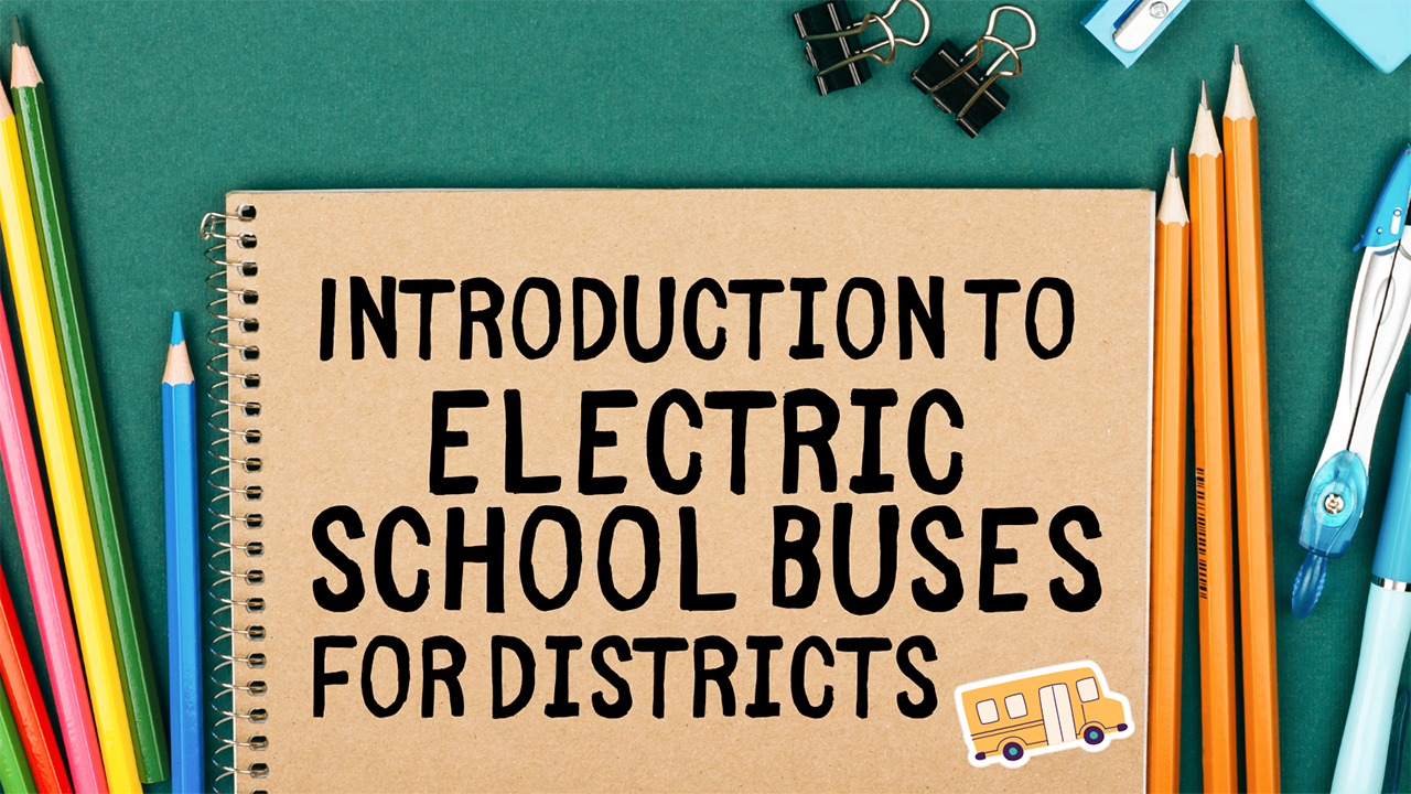 Notebook with cover. Text on cover "Introduction to Electric School Buses for Districts"